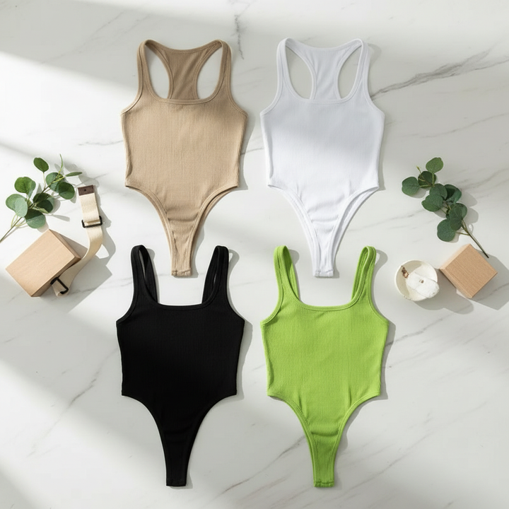 Casual knitted yoga bodysuit all four colors flat lay — khaki, white, black, and lime green ribbed racerback bodysuits on white marble surface